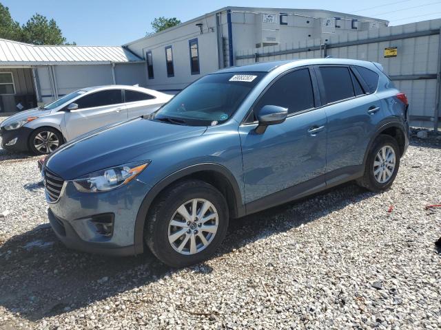 MAZDA CX-5 TOURI 2016 with VIN JM3KE4CY4G0910576 - Photo from auction