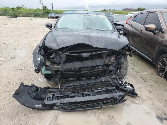 Photo 5 from auction – 2014 FORD FUSION TIT with VIN 3FA6P0K93ER235555