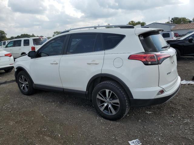 Photo 2 from auction – 2017 TOYOTA RAV4 XLE with VIN JTMRFREV5HJ702402