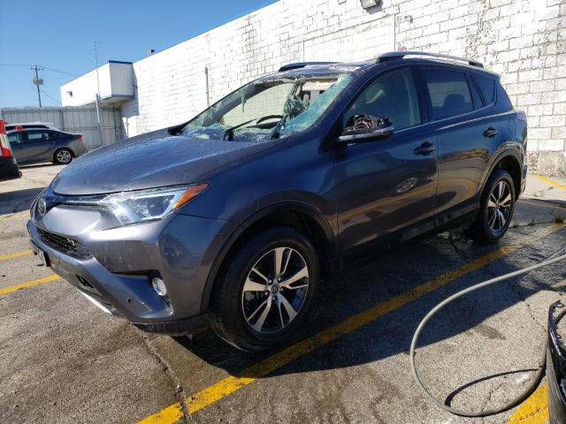 Photo 1 from auction – 2017 TOYOTA RAV4 XLE with VIN JTMWFREV5HD095662