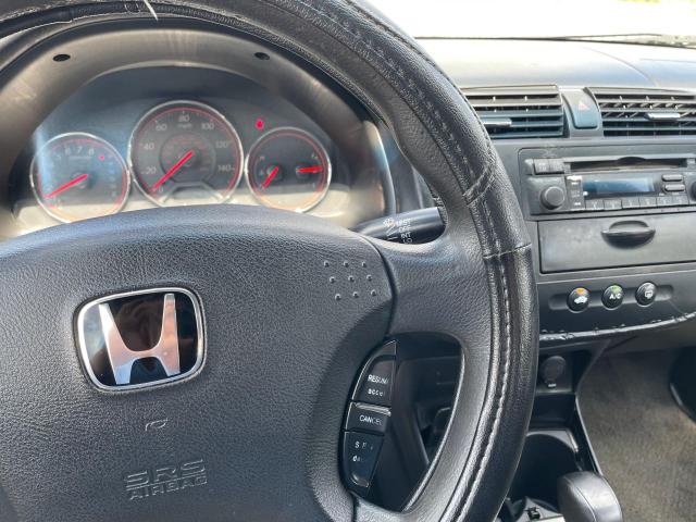 Photo 9 from auction – 2003 HONDA CIVIC LX with VIN 1HGEM22573L031202