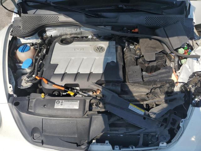 Photo 11 from auction – 2014 VOLKSWAGEN BEETLE with VIN 3VWJL7ATXEM655331