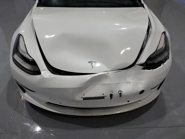 Photo 11 from auction – 2021 TESLA MODEL 3 with VIN 5YJ3E1EA1MF091468