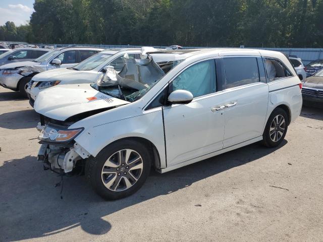 HONDA ODYSSEY TO 2014 with VIN 5FNRL5H97EB018745 - Photo from auction