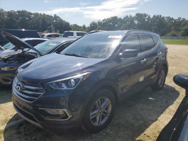 HYUNDAI SANTA FE S 2017 with VIN 5NMZU3LB3HH011015 - Photo from auction