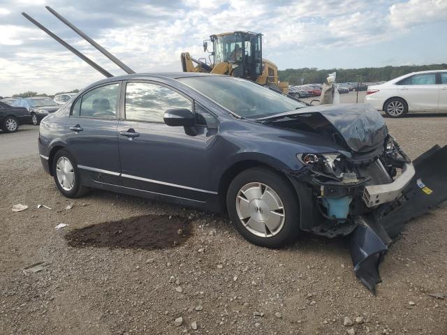 Photo 4 from auction – 2006 HONDA CIVIC HYBR with VIN JHMFA36226S001695