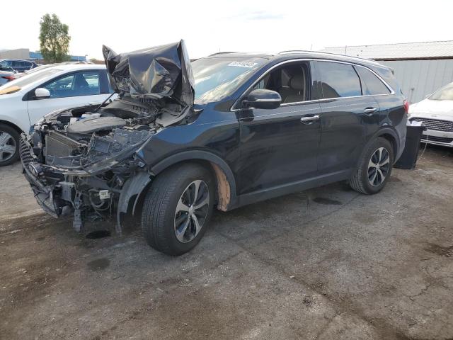 KIA SORENTO EX 2016 with VIN 5XYPH4A5XGG092960 - Photo from auction