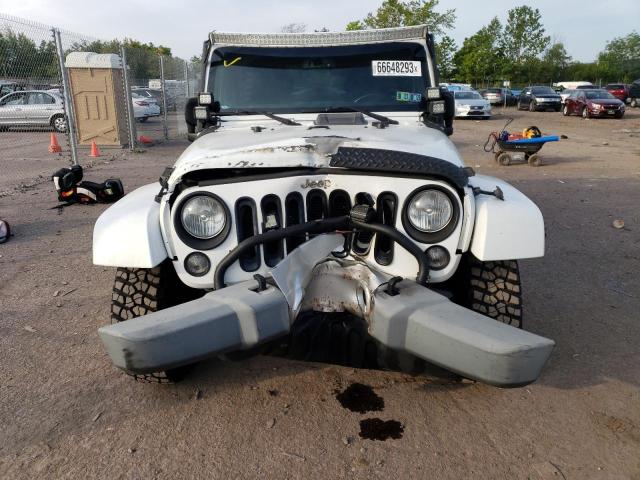 Photo 5 from auction – 2015 JEEP WRANGLER U with VIN 1C4BJWEG0FL551969