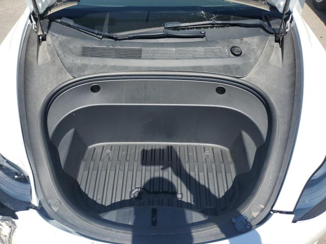 Photo 11 from auction – 2022 TESLA MODEL 3 with VIN 5YJ3E1EB0NF157535