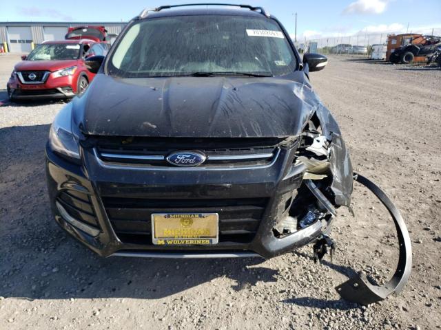Photo 5 from auction – 2014 FORD ESCAPE TIT with VIN 1FMCU9J90EUA35779