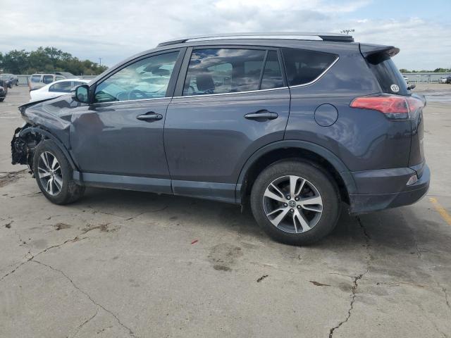 Photo 2 from auction – 2017 TOYOTA RAV4 XLE with VIN 2T3WFREV7HW343624