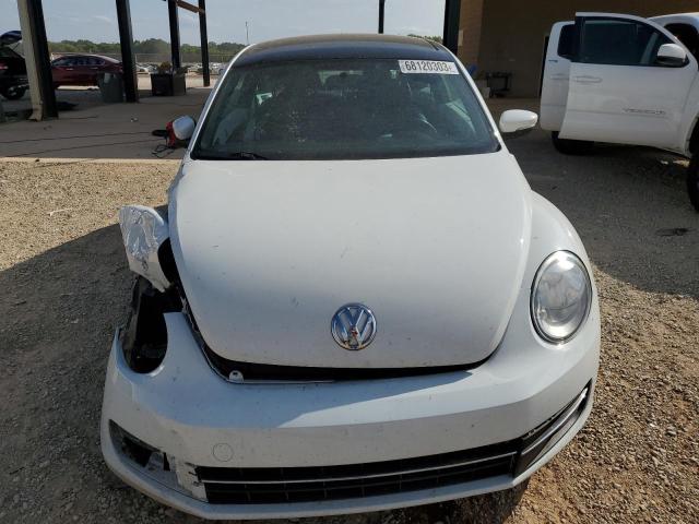 Photo 5 from auction – 2014 VOLKSWAGEN BEETLE with VIN 3VWJ17AT4EM667030