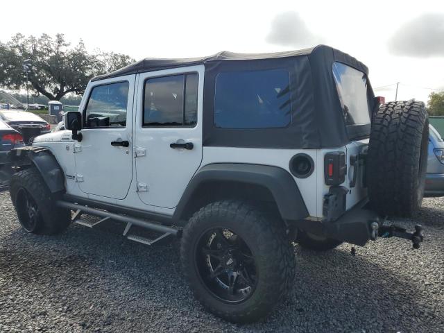 Снимка 2 от търг – 2011 JEEP WRANGLER U с VIN 1J4BA6H19BL541050
