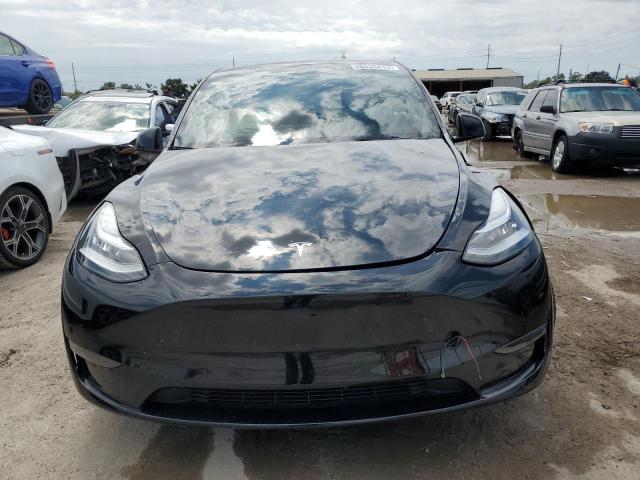 Photo 5 from auction – 2022 TESLA MODEL Y with VIN 7SAYGAEE1NF337443