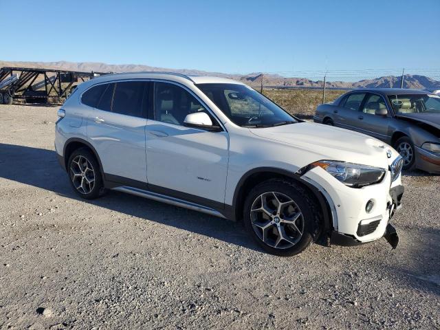 Photo 4 from auction – 2016 BMW X1 XDRIVE2 with VIN WBXHT3C38GP880287