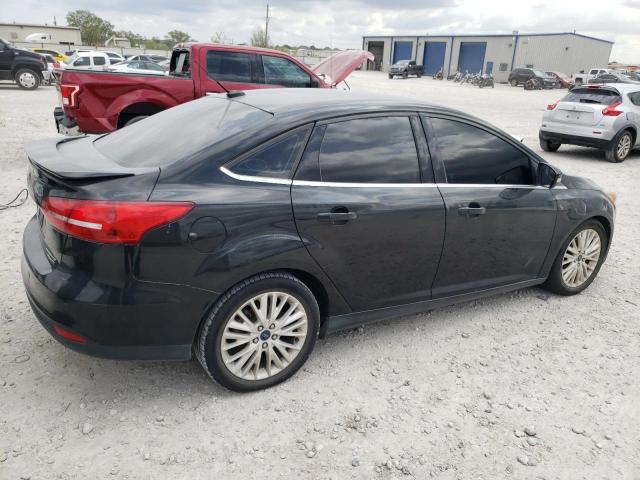 Photo 3 from auction – 2015 FORD FOCUS TITA with VIN 1FADP3J27FL240609