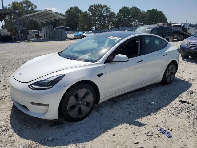 TESLA MODEL 3 2021 with VIN 5YJ3E1EA7MF987077 - Photo from auction