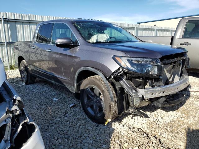 Photo 4 from auction – 2021 HONDA RIDGELINE with VIN 5FPYK3F73MB005341