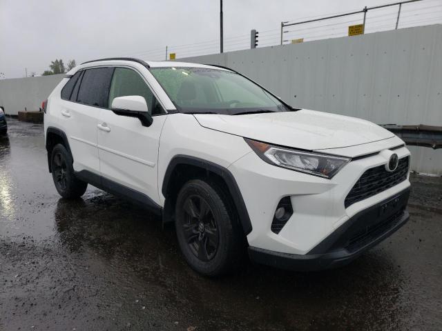 Photo 4 from auction – 2020 TOYOTA RAV4 XLE with VIN JTMP1RFV2LD058997