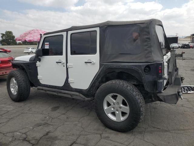 Photo 2 from auction – 2015 JEEP WRANGLER U with VIN 1C4BJWFG7FL743632
