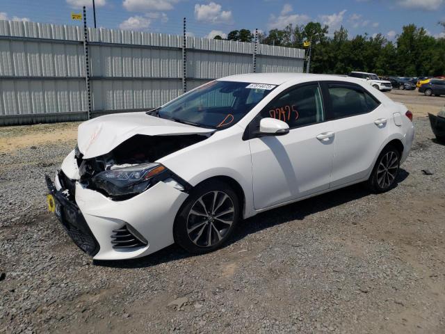 TOYOTA COROLLA L 2019 with VIN 2T1BURHE3KC242694 - Photo from auction