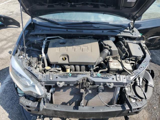 Photo 11 from auction – 2014 TOYOTA COROLLA L with VIN 5YFBURHE3EP116498