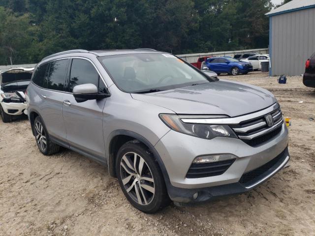 Photo 4 from auction – 2017 HONDA PILOT TOUR with VIN 5FNYF5H96HB030652
