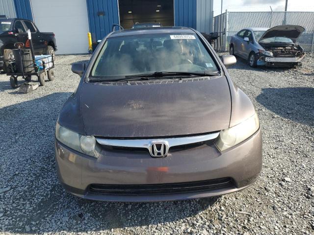 Photo 5 from auction – 2011 HONDA CIVIC LX-S with VIN 2HGFA1F65BH004201