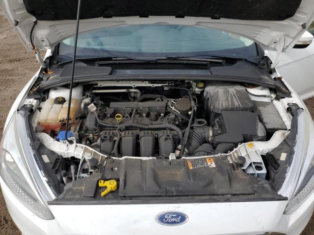Photo 11 from auction – 2015 FORD FOCUS SE with VIN 1FADP3F24FL374230