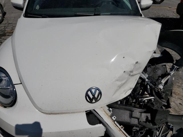 Photo 11 from auction – 2012 VOLKSWAGEN BEETLE with VIN 3VWJP7AT2CM618985