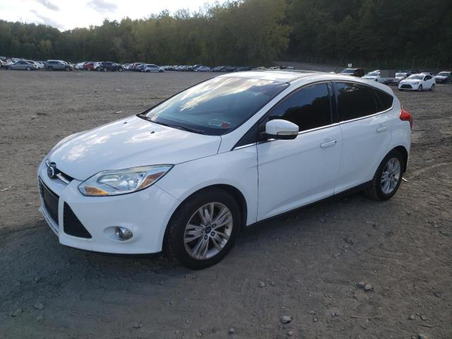 FORD FOCUS 2012 with VIN 1FAHP3M24CL469242 - Photo from auction