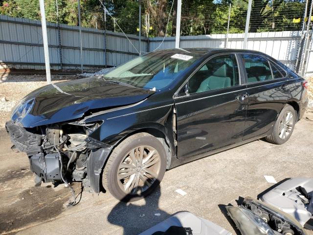 TOYOTA CAMRY LE 2017 with VIN 4T1BF1FK6HU427673 - Photo from auction