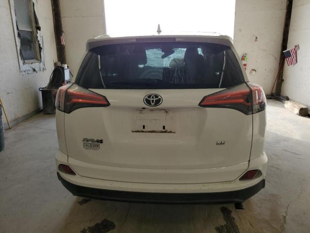Photo 6 from auction – 2018 TOYOTA RAV4 LE with VIN 2T3ZFREV6JW468987
