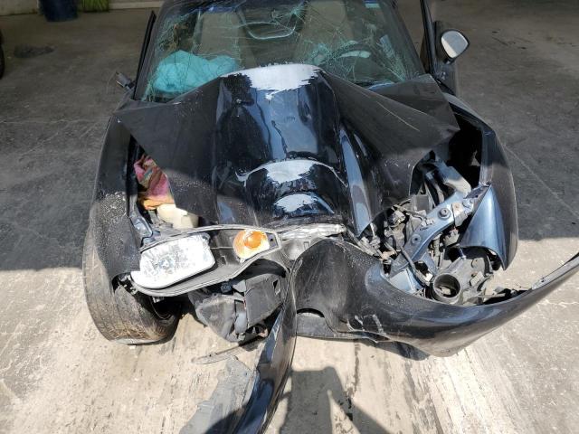 Photo 11 from auction – 1999 MAZDA MX-5 MIATA with VIN JM1NB3537X0102748