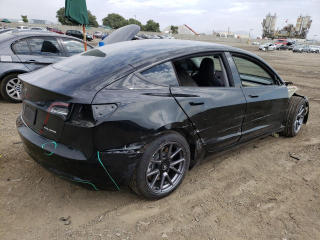 Снимка 3 от търг – 2021 TESLA MODEL 3 с VIN 5YJ3E1EB2MF002936