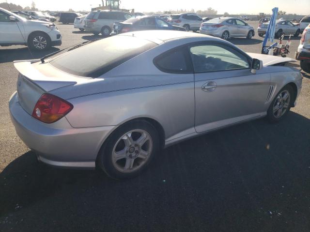Photo 3 from auction – 2004 HYUNDAI TIBURON with VIN KMHHM65D54U150587