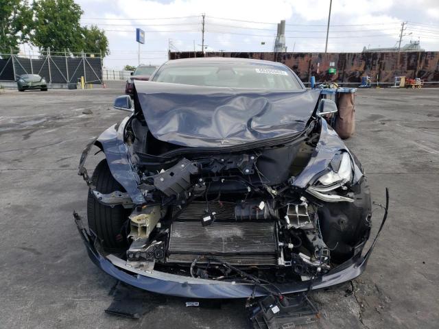Photo 5 from auction – 2018 TESLA MODEL 3 with VIN 5YJ3E1EA0JF048302