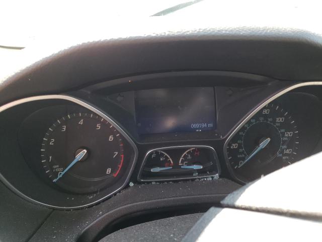 Photo 9 from auction – 2014 FORD FOCUS SE with VIN 1FADP3F28EL103752