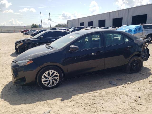 TOYOTA COROLLA L 2017 with VIN 5YFBURHE1HP709779 - Photo from auction