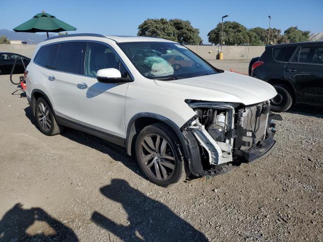 Photo 4 from auction – 2018 HONDA PILOT ELIT with VIN 5FNYF6H04JB060679