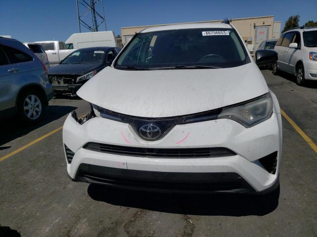 Photo 5 from auction – 2017 TOYOTA RAV4 LE with VIN 2T3BFREV7HW564445