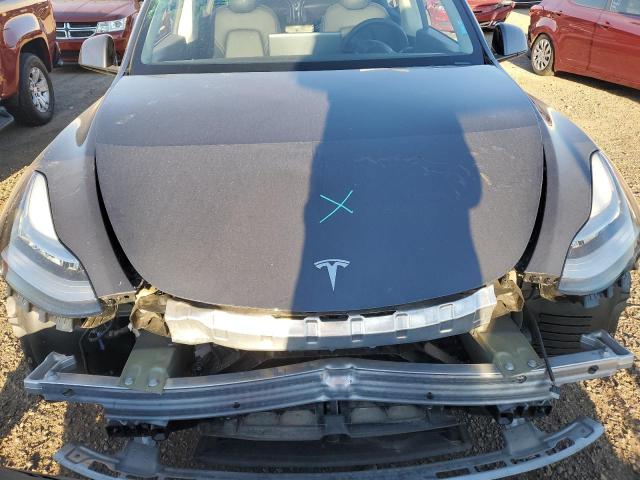 Снимка 11 от търг – 2022 TESLA MODEL Y с VIN 7SAYGDEE8NF355987