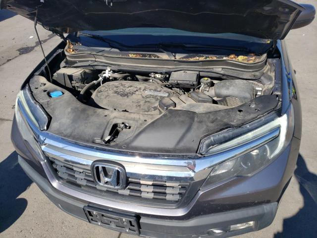 Photo 11 from auction – 2018 HONDA RIDGELINE with VIN 5FPYK3F68JB002115