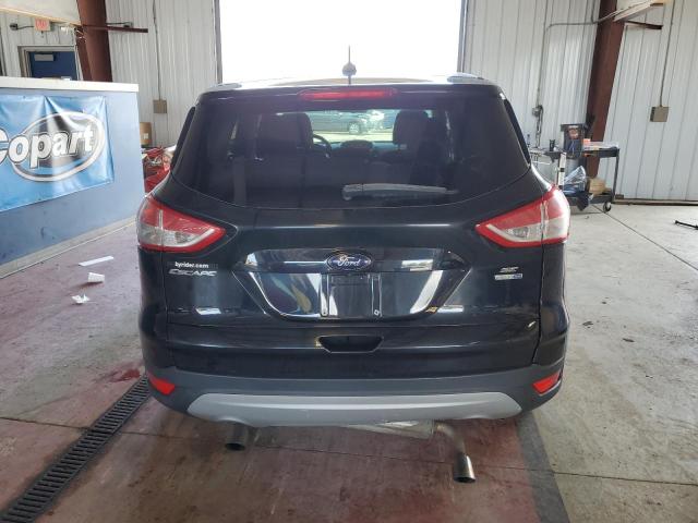 Foto 6 de la subasta – 2016 FORD ESCAPE SE con VIN 1FMCU9G99GUA30591