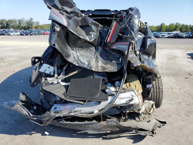 Photo 6 from auction – 2021 TESLA MODEL Y with VIN 5YJYGDEE9MF259720