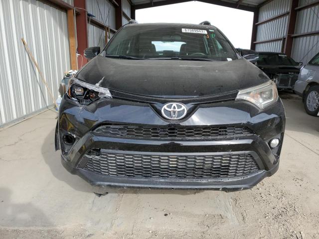 Photo 5 from auction – 2016 TOYOTA RAV4 SE with VIN 2T3NFREV5GW308803