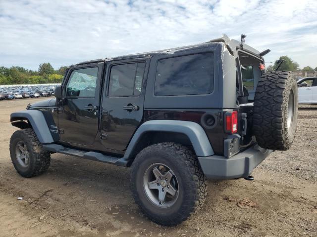 Photo 2 from auction – 2014 JEEP WRANGLER U with VIN 1C4BJWDG1EL208328