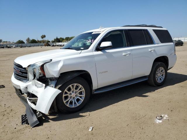 GMC YUKON SLE 2015 with VIN 1GKS2AKC0FR605712 - Photo from auction