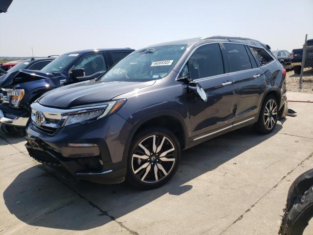 HONDA PILOT TOUR 2019 with VIN 5FNYF5H90KB009383 - Photo from auction