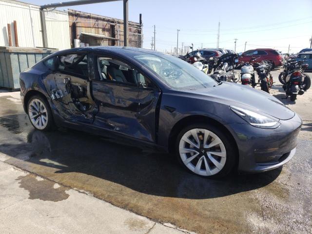 Photo 4 from auction – 2022 TESLA MODEL 3 with VIN 5YJ3E1EB0NF144185